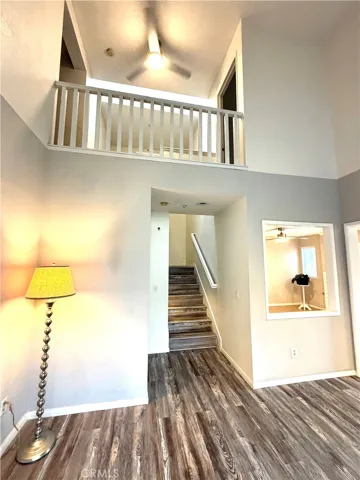 Entry living room has high ceilings