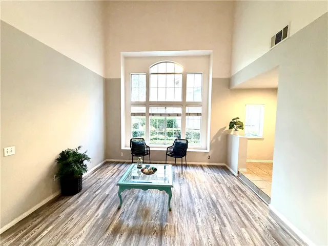 Entry Living Room with Large Cathedral Style window