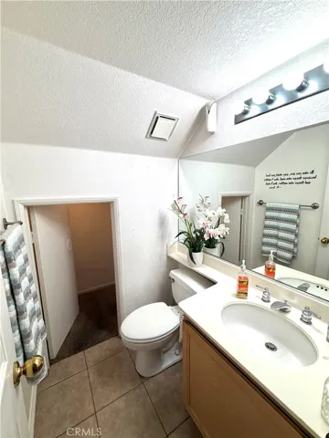 Half Bathroom located by garage entry door