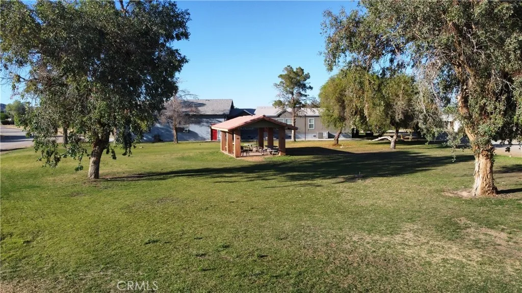 Large grassy park area adjacent to the house