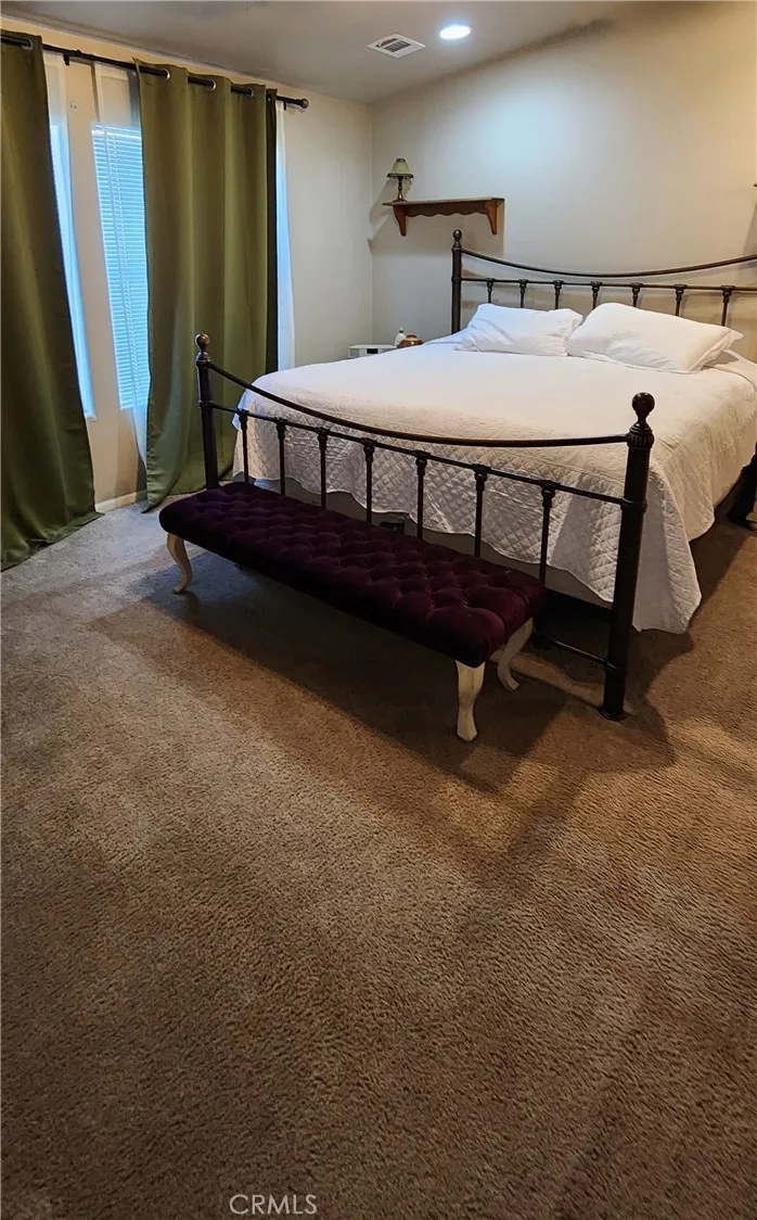 Primary bedroom with ensuite bathroom