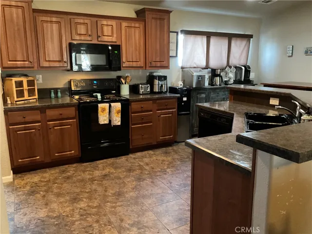 Large kitchen is open to the dining area and living room