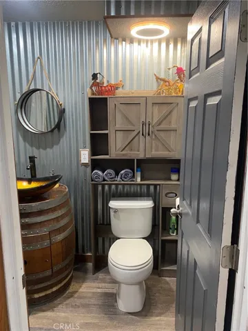 Nostalgic full bathroom in garage tavern
