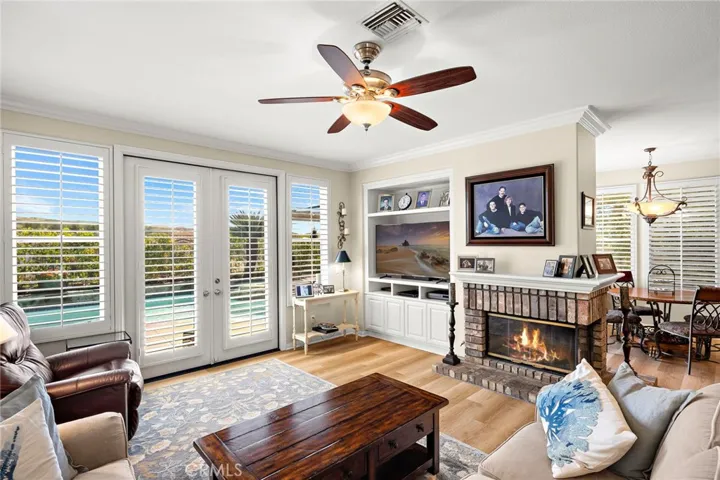 Family room with fireplace and French doors
