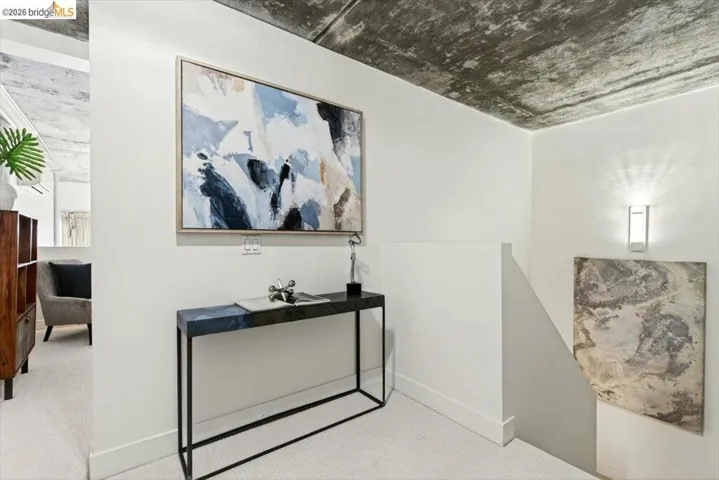 Exposed concrete ceiling with industrial aesthetic