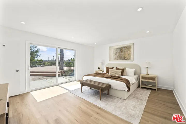 Master bedroom overlooking pat