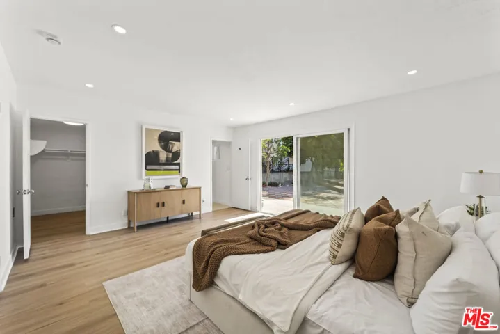 Master bedroom overlooking pat