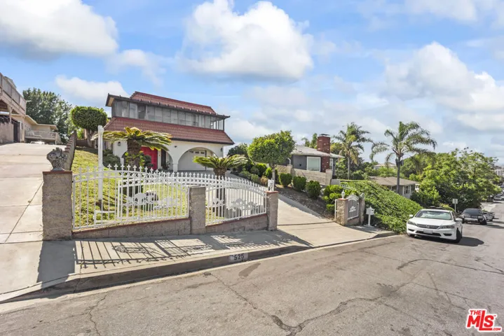 Front of home with electric ga
