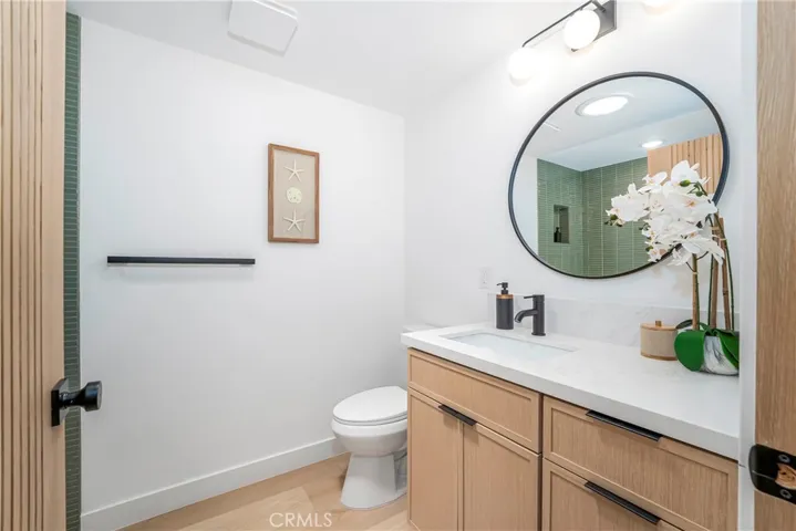 Guest bath with solartube, vanity with drawers, medicine cabinet, electric receptable for bidet, oversized 32” Wide by 66” long acrylic soaking tub