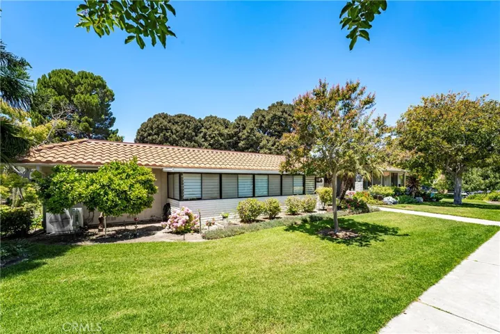 No stairs to the home or carport, lovely greenbelt area