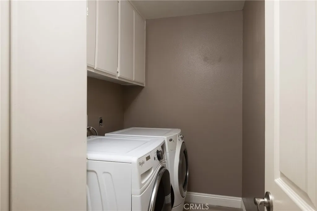 Laundry room located downstairs.