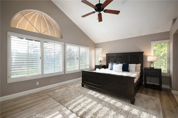 Upstairs the spacious primary suite delivers expansive Tijeras Creek Golf Course views.