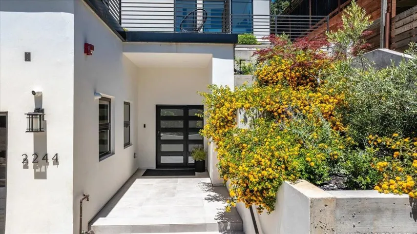 Doorway entry to ELEVATOR and interior garage entry