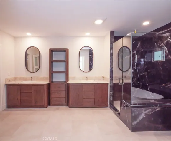 Vanity and Shower in Primary Bathroom
