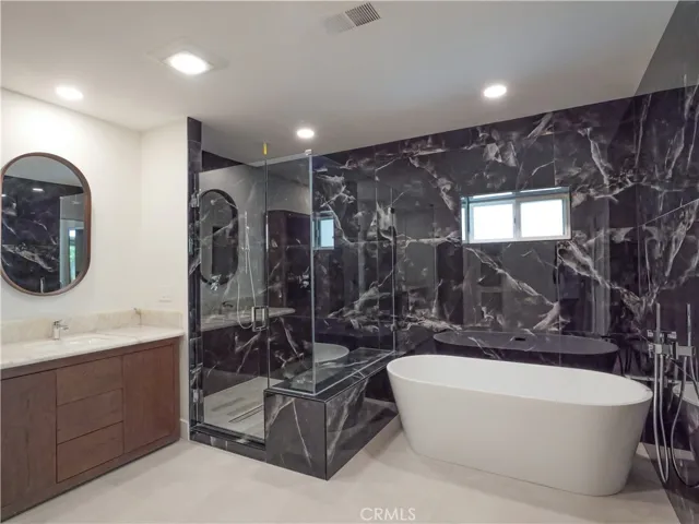 Bathtub and Shower in Primary Bathroom