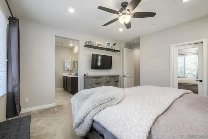 Primary bedroom with views to bathroom