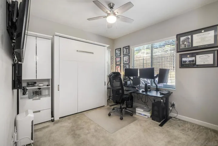 Entry level bedroom currently being used as an office