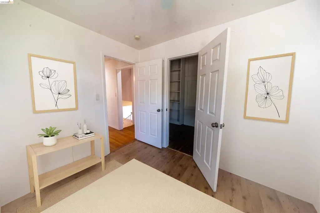 Room with light wood-finish flooring