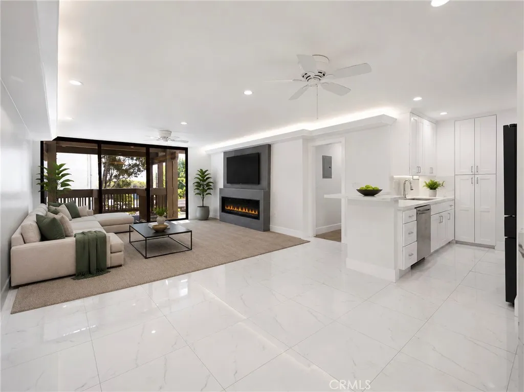 kitchen and virtually staged living room