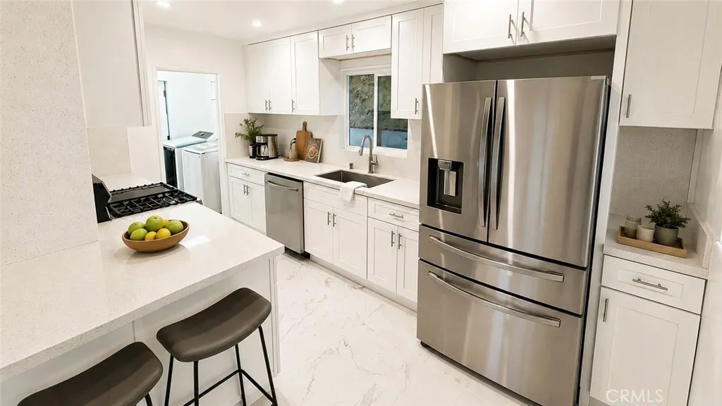 Kitchen — Virtually staged/enhanced with decorative accessories only. Accessories are not included. Original unstaged photo shown adjacent.