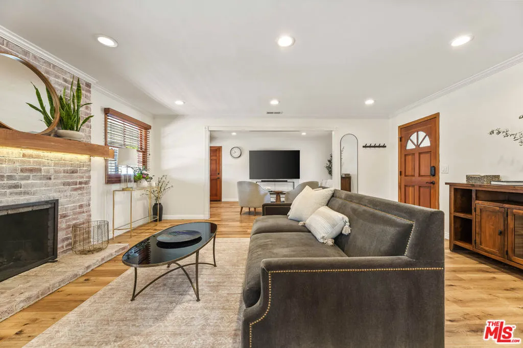 Living room with view of woodb