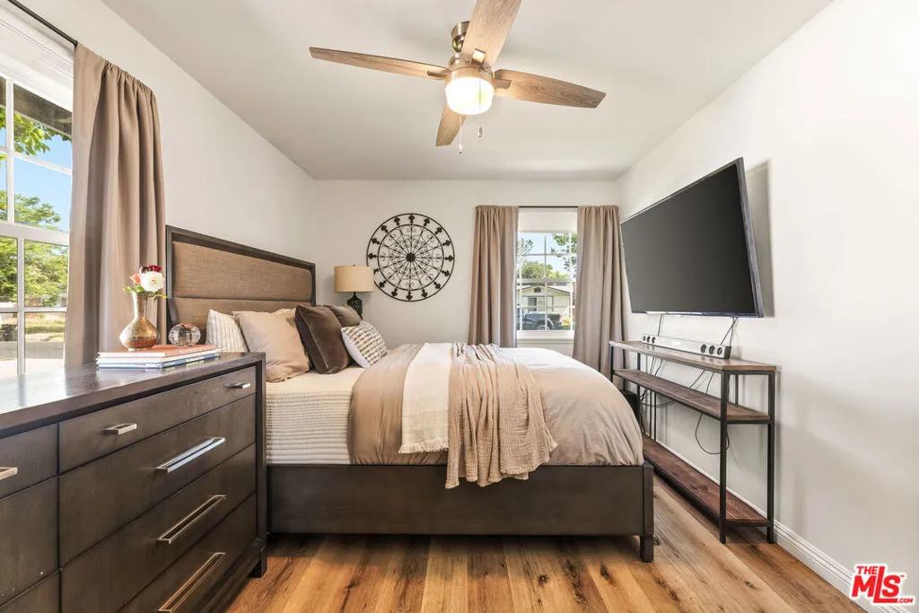 Primary bedroom with ceiling f