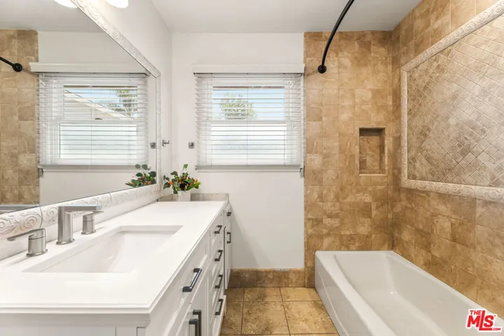 Updated bathroom with newer ba