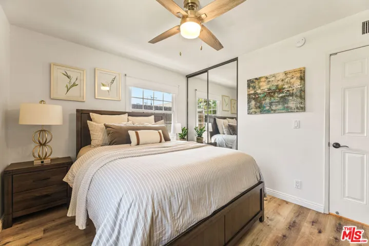 2nd bedroom with ceiling fan &