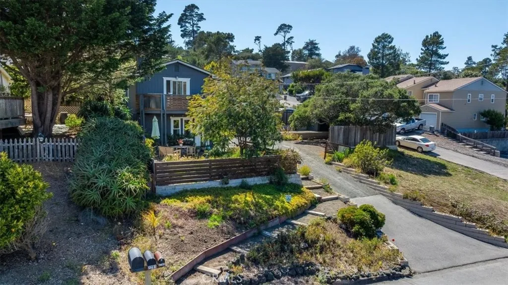 Aerial view of house from street.