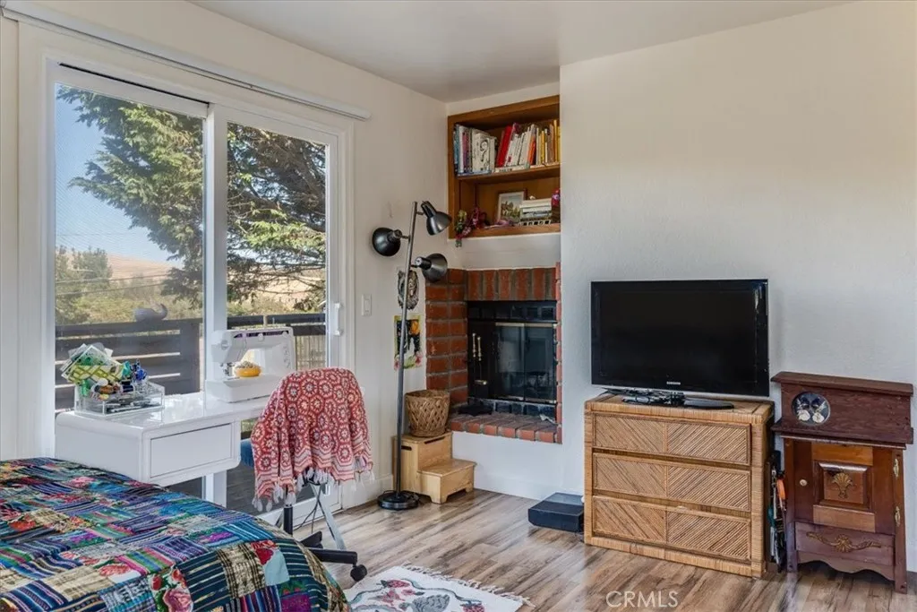 Front bedroom includes fireplace.
