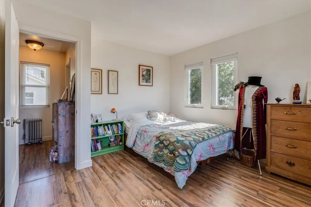 Other view of bedroom showing hallway.