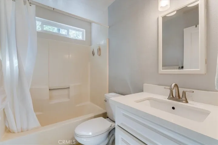 Full bathroom includes tub and shower.