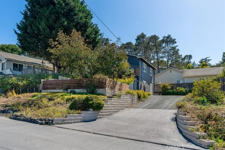 View showing driveway and house (there is a gate at top of driveway).