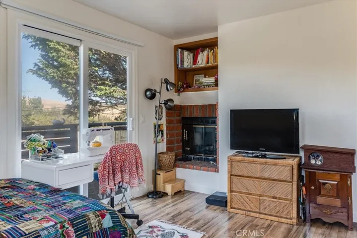 Front bedroom includes fireplace.