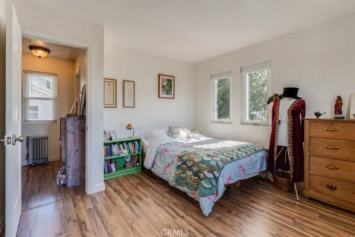 Other view of bedroom showing hallway.