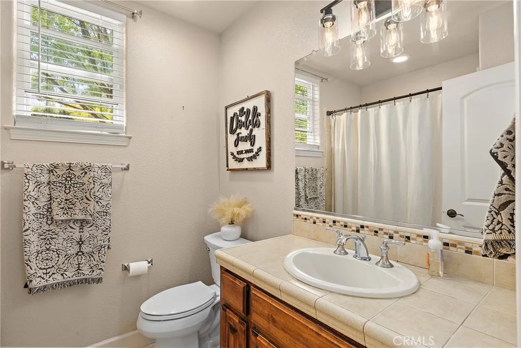 The downstairs bathroom is convenient to the bedroom as well as the family room & kitchen for guests.