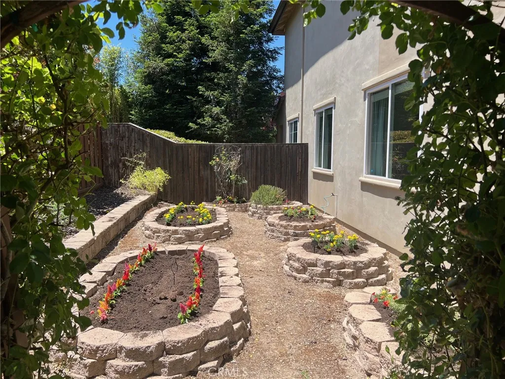 The side yard is ready to grow your own garden.