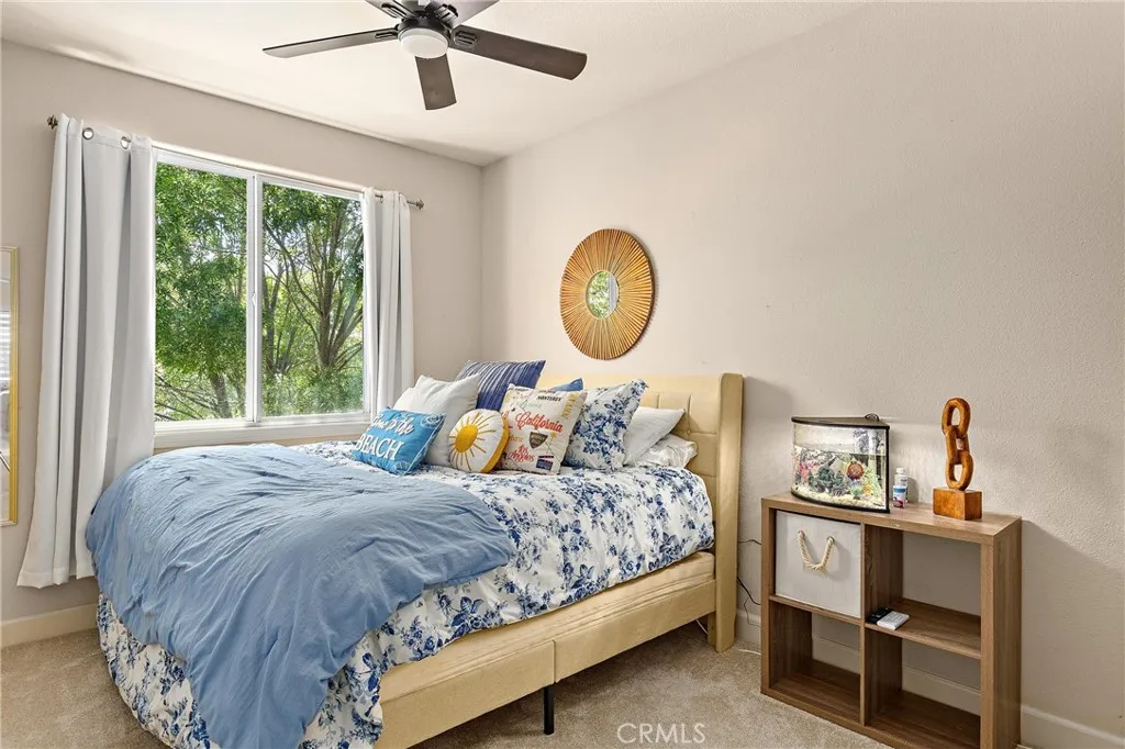 The third upstairs guest bedroom, also with a small walk-in closet.
