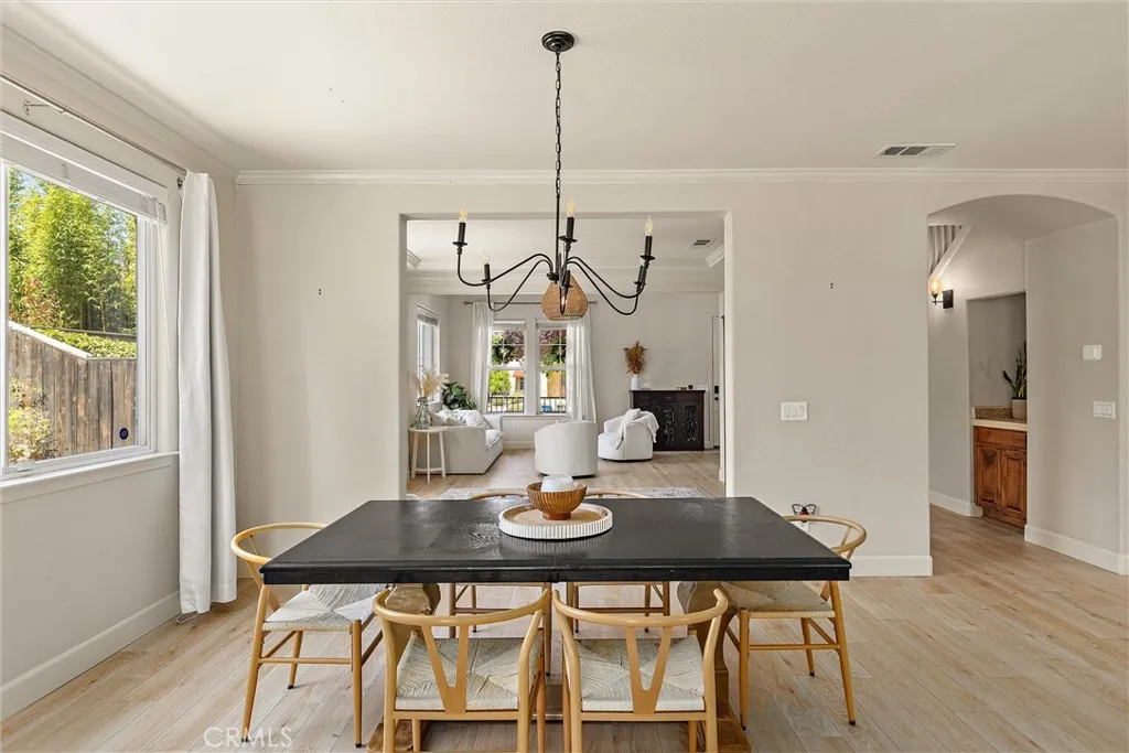 The kitchen dining area opens to the front rooms, as well as into the kitchen & family room.