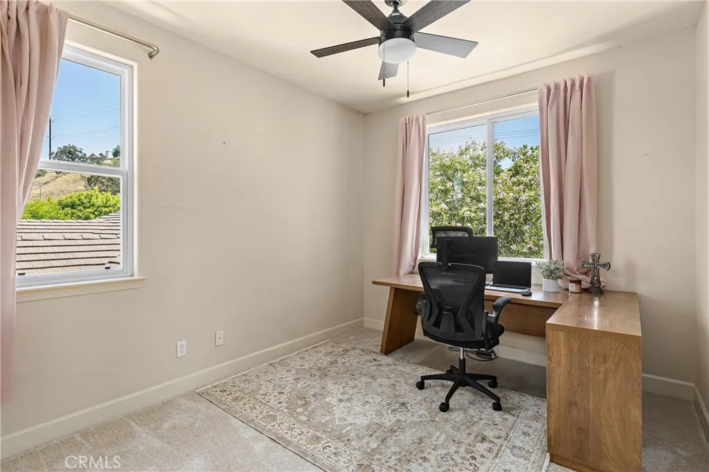 The second upstairs guest bedroom, currently used as an office.