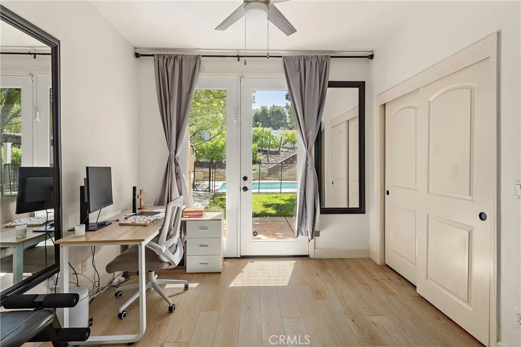 The downstairs office/bedroom with access to the backyard.