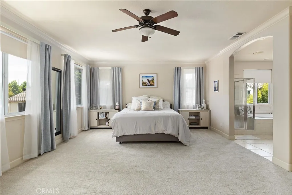 Have you ever dreamt of an enormous primary bedroom, bathroom, and closet? This is the dream!