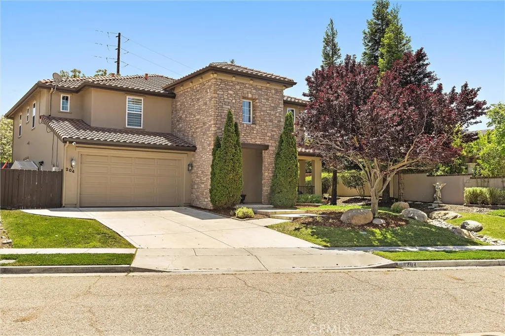Welcome to this beautiful home with stone & stucco exterior and gorgeous landscaping in a prime location of Paso Robles!
