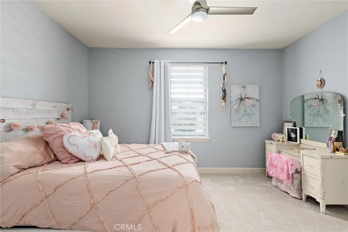 The first upstairs guest bedroom is very large, it also has a small walk-in closet.