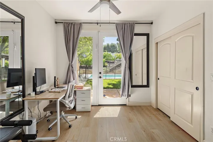 The downstairs office/bedroom with access to the backyard.