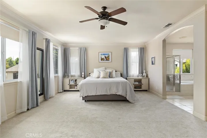 Have you ever dreamt of an enormous primary bedroom, bathroom, and closet? This is the dream!