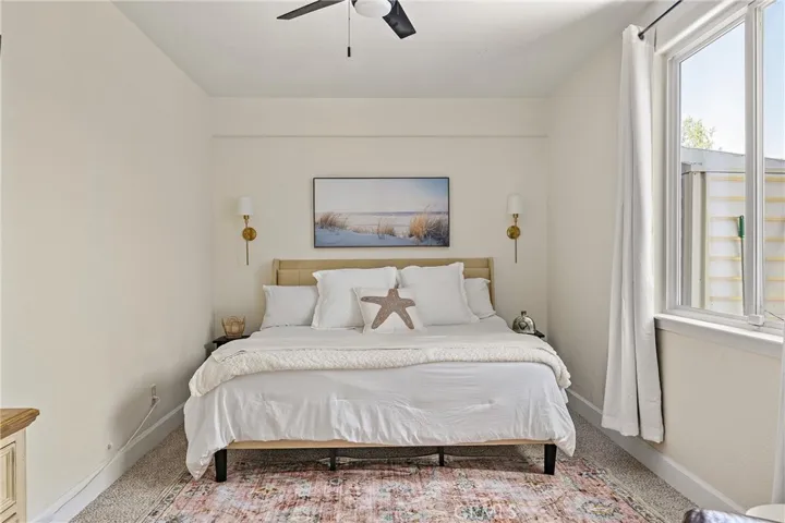 The large bonus bedroom downstairs, connected through the office area. This is a great bedroom for guests, or multigenerational living.