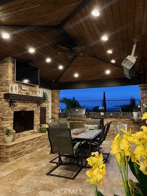 Outdoor gazebo with granite, fireplace,barbecue, speakers