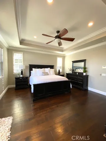 Master with wood flooring