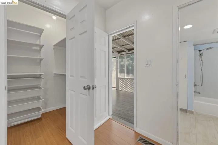 Interior space featuring wood-finish flooring